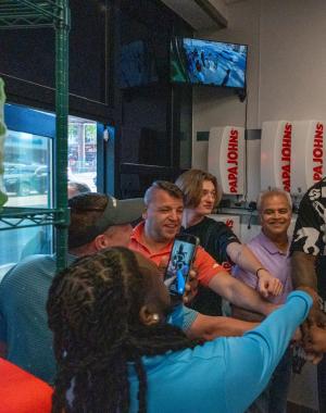 Shaq meets with team members at his new restaurant